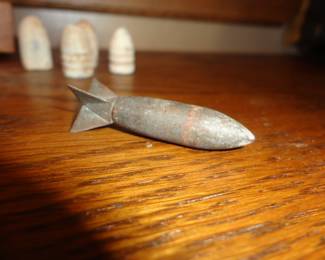 Lazy Dog - Kinetic projectile aerial dart used during the Korean and Vietnam War. Dropped from aircraft to penetrate targets. Brass