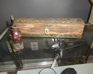 Item on right is Mexican folk art black clay pipe (barro negro)