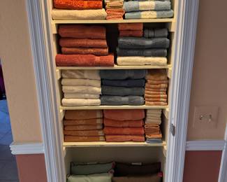 Beautiful towels, throw pillows and standard and king size pillow cases.