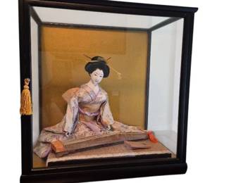 Japanese Geisha Doll Playing a Stringed Instrument