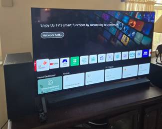 LG 2022 smart TV with sound bar and speaker and 3D glasses 