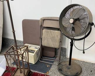 folding table, chairs, fan, air conditioner, rug