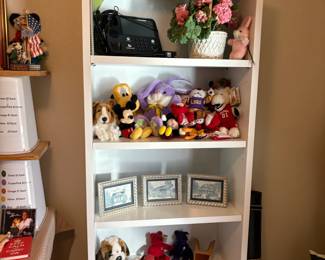 white bookcase, stuffed animals, decor
