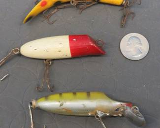 Lot 53. Hellin Flatfish, Millsite Sinker, and an unidentified red and white wooden bait