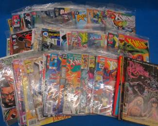 Lot 67. 75 DC and Marvel comic books. Many are bagged