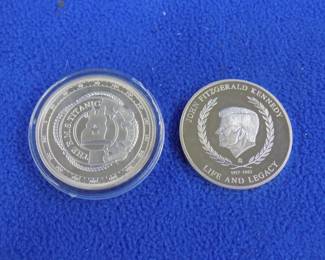 Lot 203. Collectible medallions with unknown composition:. Titanic 100 year anniversary. John Fitzgerald Kennedy.