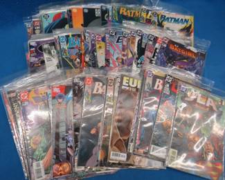 Lot 69. 71 DC and Marvel comic books. Most are bagged