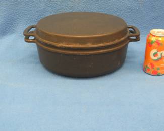 Lot 31. Cast-iron Lauffer chicken fryer. Made in England.
