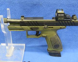 Lot 18. Beretta APX A1 Tactical 9mm pistol with a Holosun X2 solar Red Dot optic, four magazines, threaded barrel, changeable backstraps, and original case.