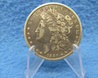 Lot 303. 1884 P Morgan silver dollar