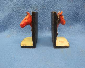 Lot 324. Cast-iron horsehead bookends