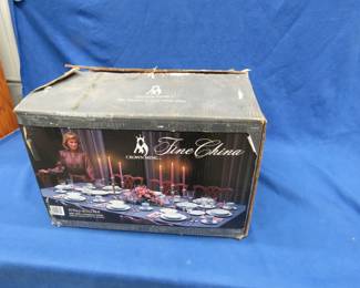 Lot 360. Crown Ming Fine China set, appears to be an unused open box.