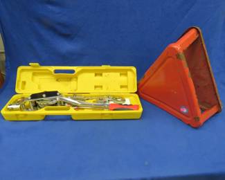 Lot 184. Cable puller and a small rolling shop seat that could use some paint