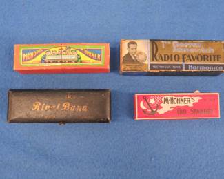 Lot 276. Four empty harmonica boxes including Hohner Monopoly and "Old Standby", Borrah Minevitch, and Messner's Rival Band.