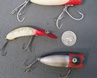 Lot 54. Heddon Tadpolly Spook, Heddon Baby Lucky 13, and a MirrorOlure Catch 2000 baits