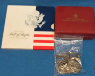 Lot 126. Sterling Silver and more: Sterling jewelry weighing 3.193 ounces. 2008 commemorative 20-gram sterling triangle. 90% silver proof half dollar.