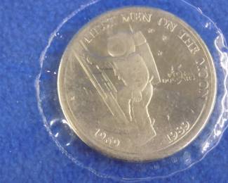 Lot 220. 1989 90% $5.00 coin from the Marshall Islands. Approximately .803 troy ounce.