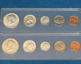 Lot 121. Two 1964 type sets