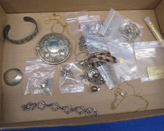 Lot 135. Costume jewelry and small golden coins. Coins are not actual gold, but layered in fine gold bullion.