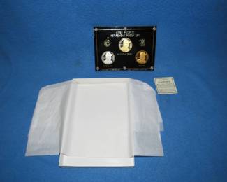 Lot 250. Kirby Pucket Retirement Proof Set with three medallions: one with one oz. of .999 silver