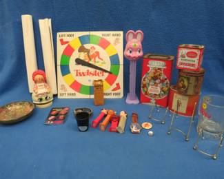 Lot 361. Misc. collectibles including Pez dispensers, tins, plate holders, and more