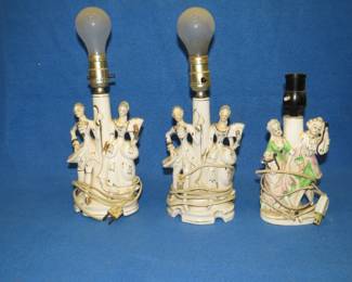 Lot 75. Three figural lamps including a matching pair