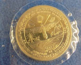Lot 207. 1989 90% silver $5.00 coin from the Marshall Islands. Approximately .803 troy ounces each