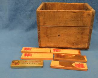 Lot 169. Vintage Land O Lakes wooden box and Blackfeet pencil sets