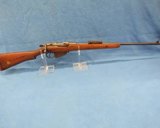 Lot 12. Sporterized SMLE Mark #1 .303 bolt-action rifle. S/N 9215. Includes Kolpin suede case.