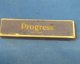 Lot 158. Huthmeinel Progress tremolo 40-hole harmonica in the key of G and the box in fair condition