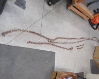 Lot 357. 24' of 3/8" chain (no hooks) and three other pieces of chain