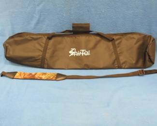 Lot 218. Ice fishing rod case and a gun sling