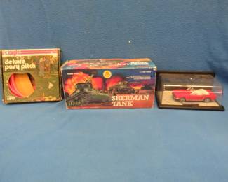 Lot 358. Die-cast 1964 1/2 Mustang, untested Radio Shack radio-controlled Sherman Tank, and a Posy Pitch