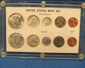 Lot 257. 1964 mint set with coins from Philadelphia and Denver including 90% halves, quarters and dimes