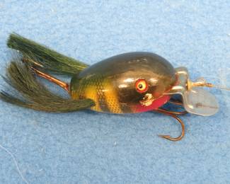 Lot 57. CCBC 1 7/8" wooden Dingbat bait with glass eyes