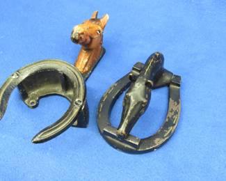 Lot 147. Vintage brass horse head door knocker and a cast iron horse tack hanger