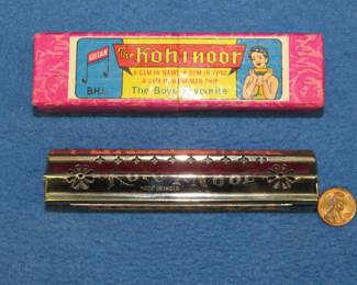 Lot 270. BHI-kor-i-noor "The Boys favorite" tremolo harmonica in excellent condition. Made in India.