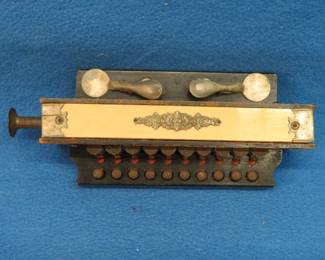 Lot 153. Very old Hohnerette ? Blow Accordion or flute harmonica with 10 keys and two chord buttons. Poor sound. Minimum bid $100.