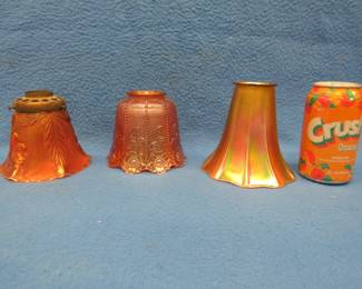 Lot 33. Three different marigold carnival glass lamp shades. 2" fitters.