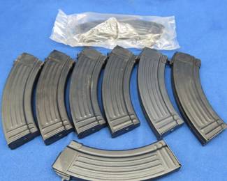 Lot 70. Eight metal 30-round AK-47 magazines
