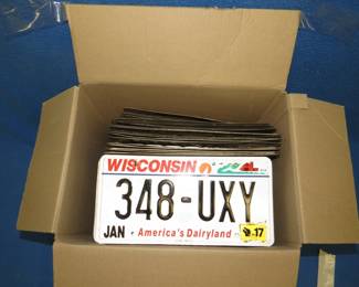 Lot 78. 26 lbs. of Wisconsin license plates