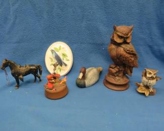 Lot 378. Ceramic figurines including two owls, a Mountain Bluebird, and Redhead duck. Also includes a metal horse and a working music box.