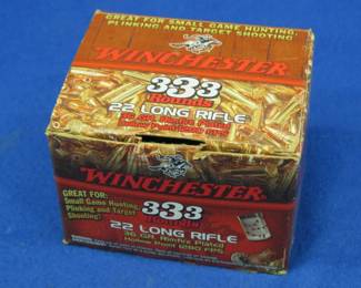 Lot 46. Winchester 22LR rounds in an opened box marked 333 rounds, looks to be mostly unused