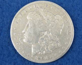 Lot 27. 1891 O Morgan silver dollar