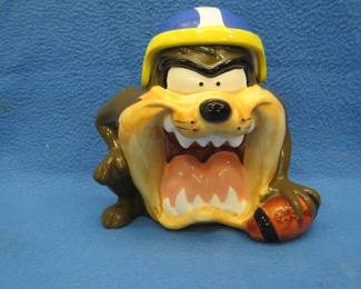 Lot 77. 1993 Warner Bros. Tasmanian Devil football player cookie jar. Excellent condition.