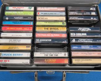 Lot 287. Cassette tapes in a carrying case. Rolling Stones, Rod Stewart, 50s Oldies, and more
