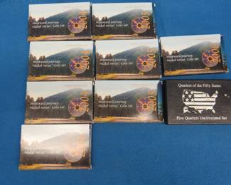 Lot 256. Eight sets of Westward Journey nickels with dates as shown in the photos, and one set of five 1999 uncirculated Quarters