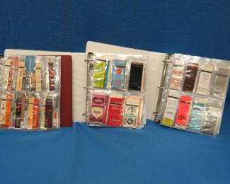 Lot 245. Three 3-ring binders filled with hundreds of matchbook covers