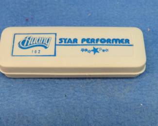 Lot 157. Huang Star Performer diatonic 10-hole harmonica. Sounds great