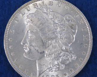Lot 400. 1885 O Morgan silver dollar